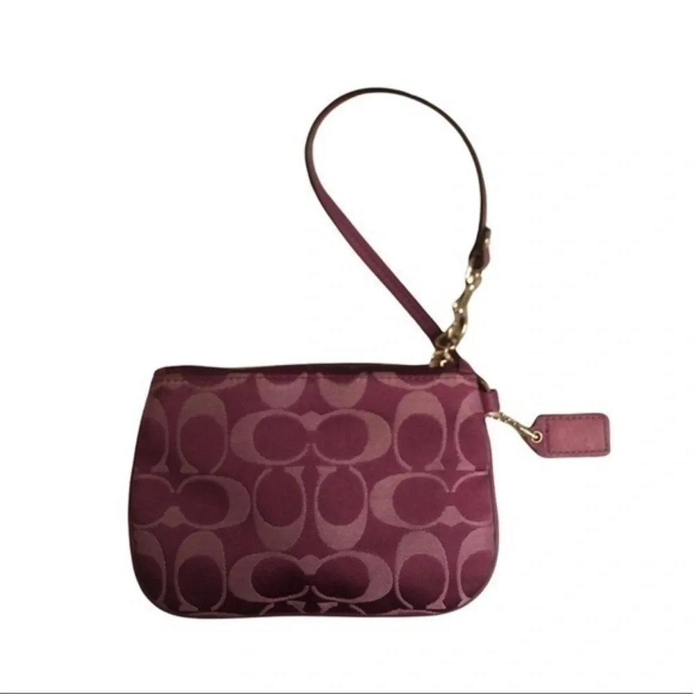 Coach purple signature c wristlet bag
